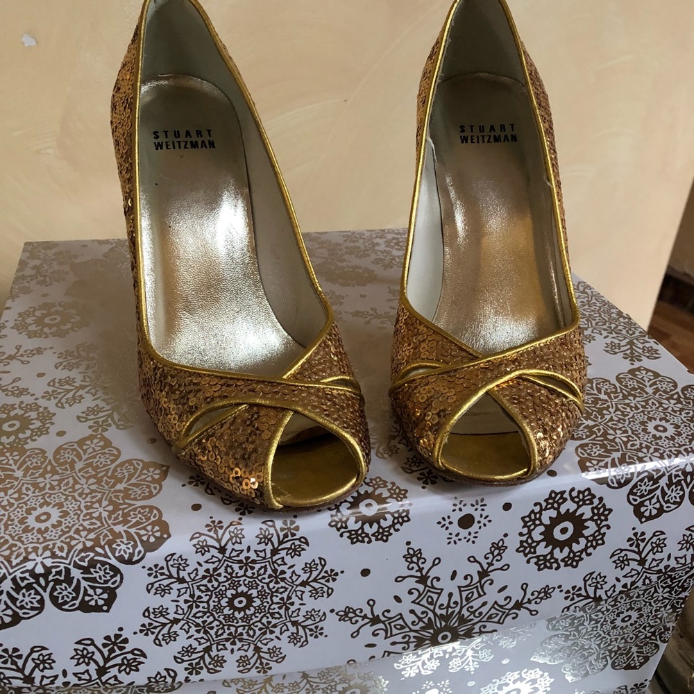 Stuart Weiztman shoes.